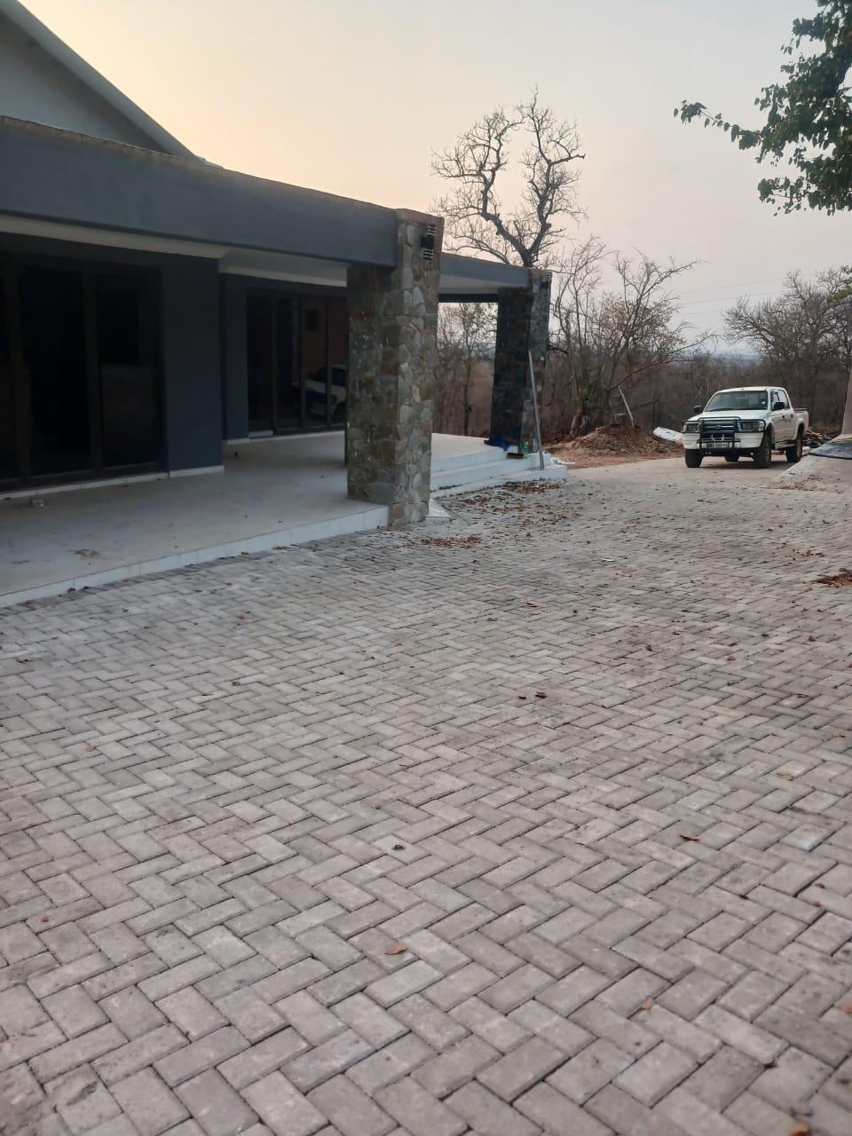 Reis Group residential paving and stone-finished entrance